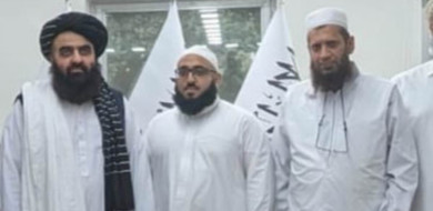 NHS chaplain triggers outrage as he poses with the Taliban while on his summer holidays from a London hospital including the regime's foreign minister who once warned the west of 'serious consequences' if Osama Bin Laden was killed